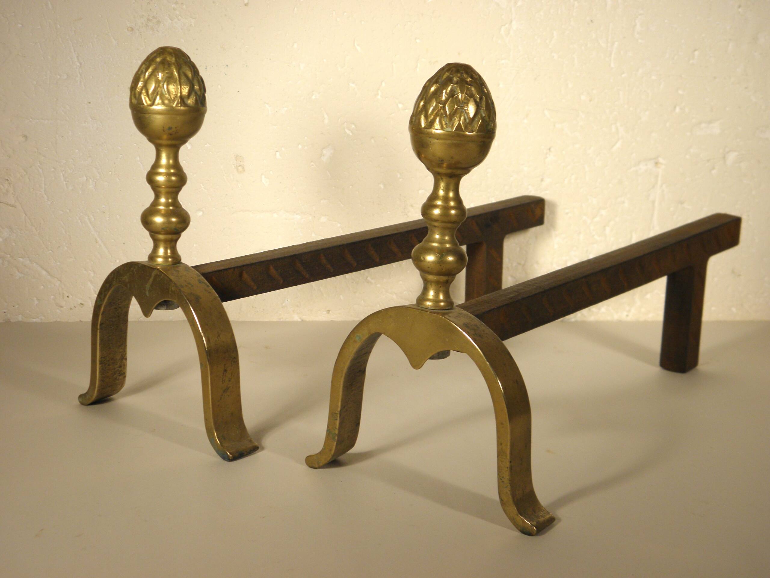 Pair of brass “pine” andirons