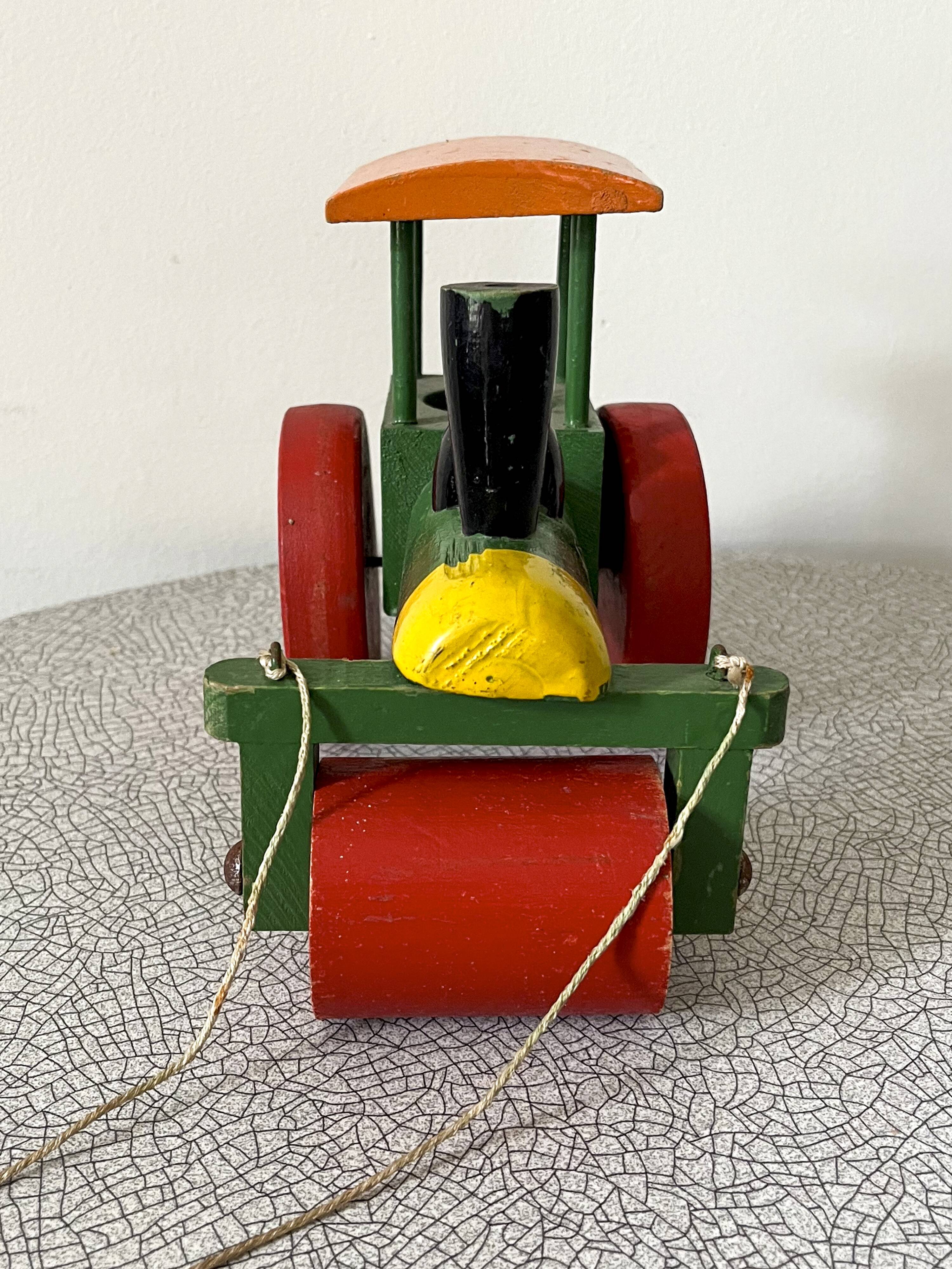 Wooden road roller tractor