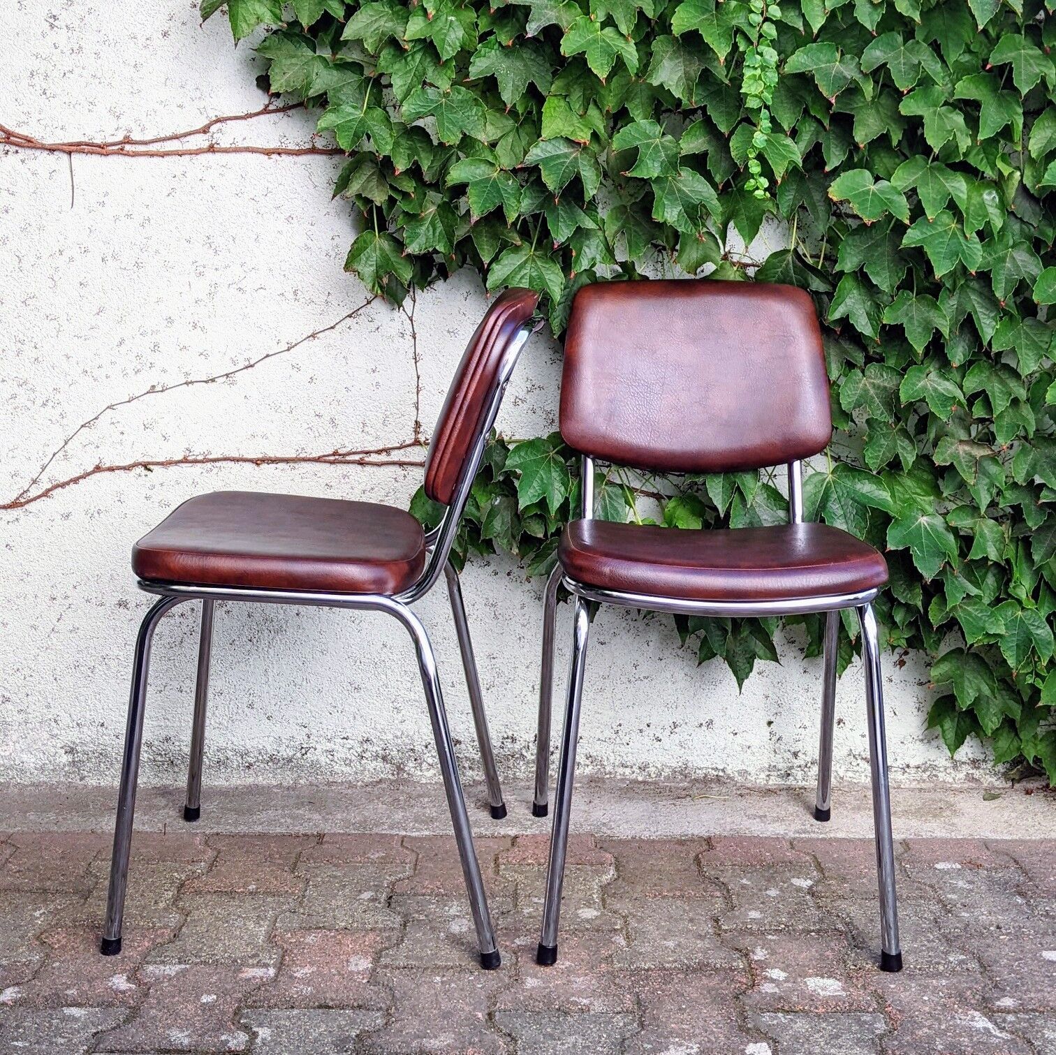 70s metal and imitation leather chairs