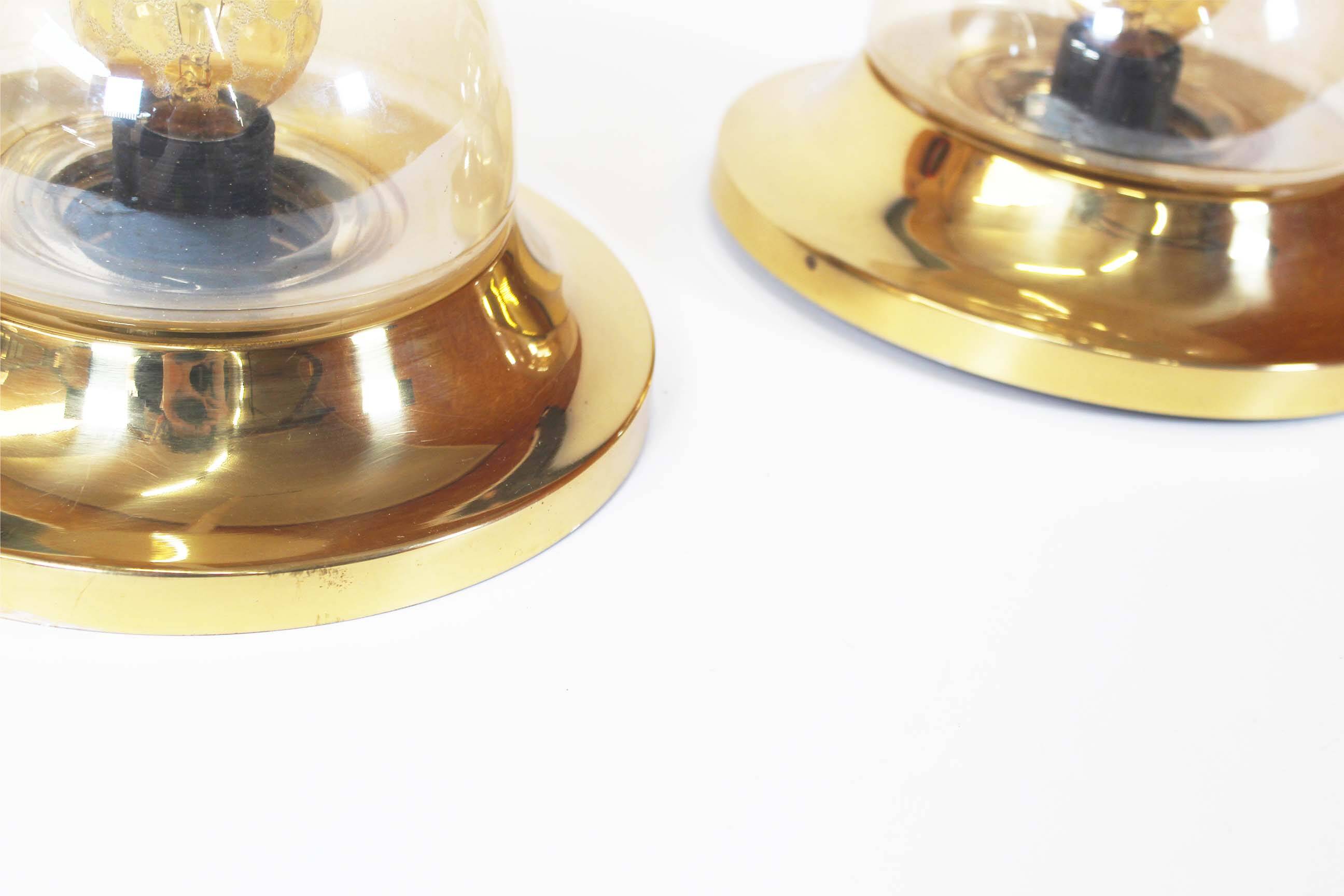Pair of 1970’s petite brass & glass wall lights