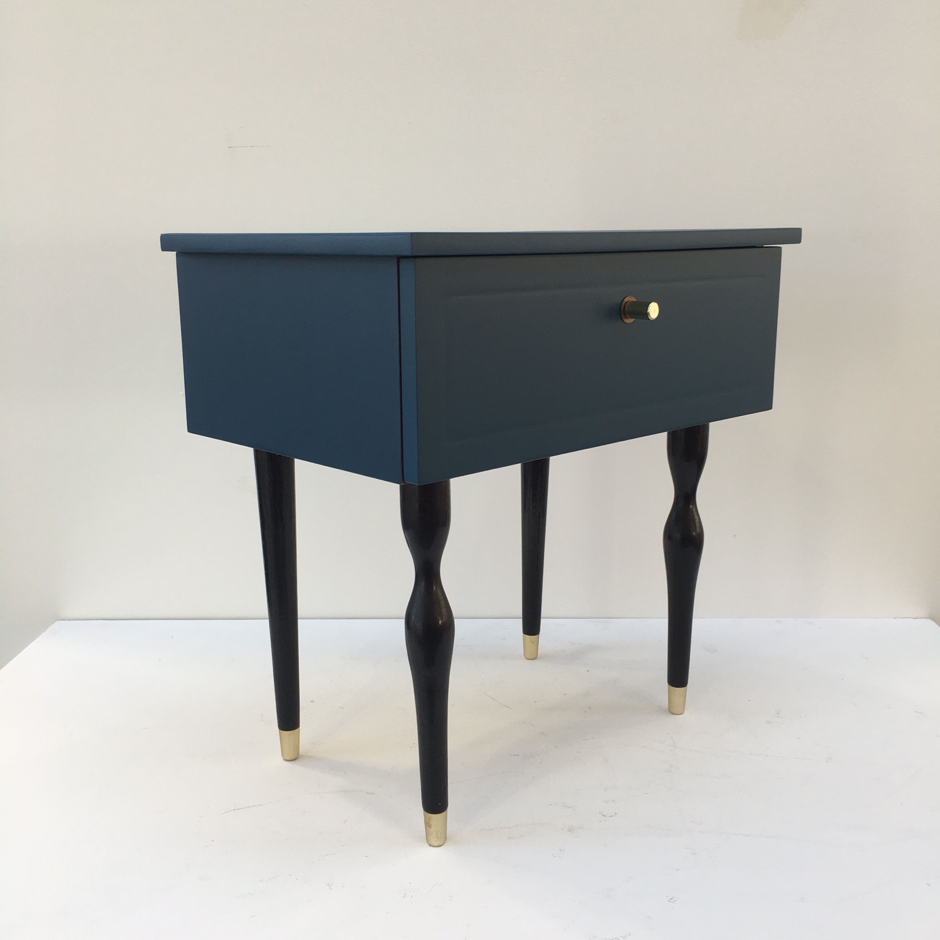 Pair of bedside tables with spindle feet