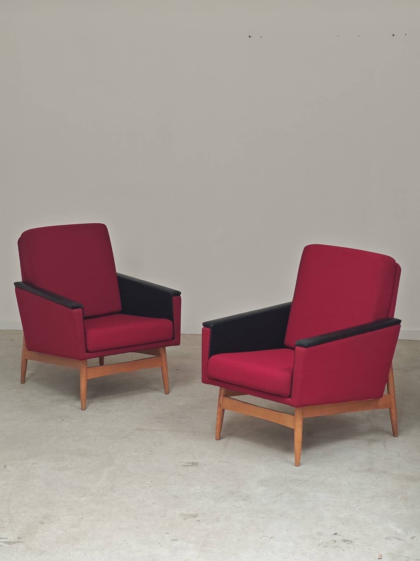 Pair of Drevotex Zamberk armchairs, red fabric and faux leather 1970