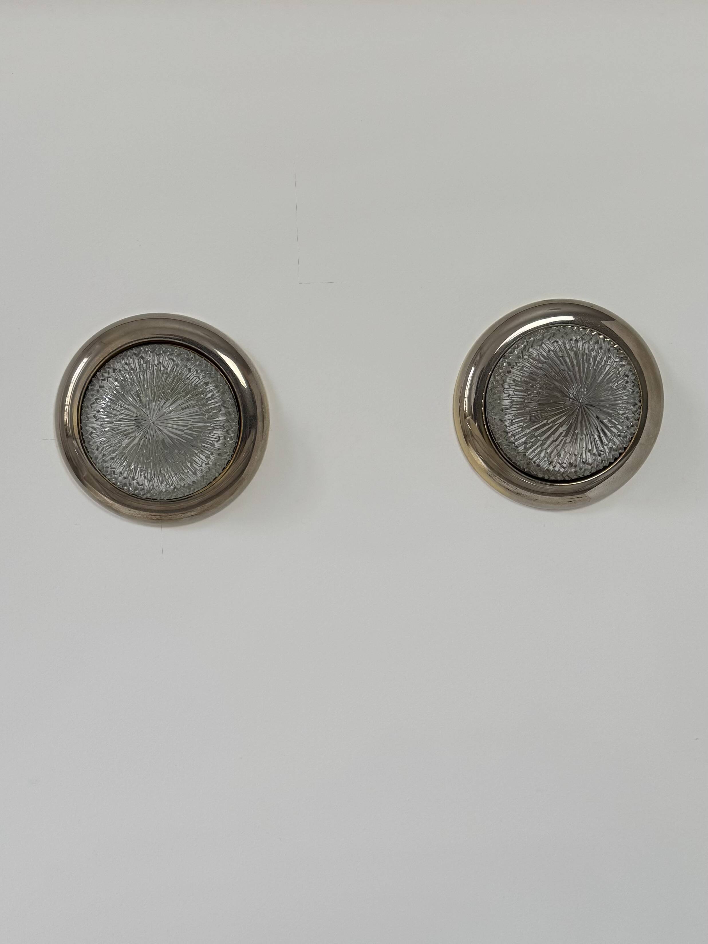 Pair of vintage wall lights, brass and pressed moulded glass, France, 1960.