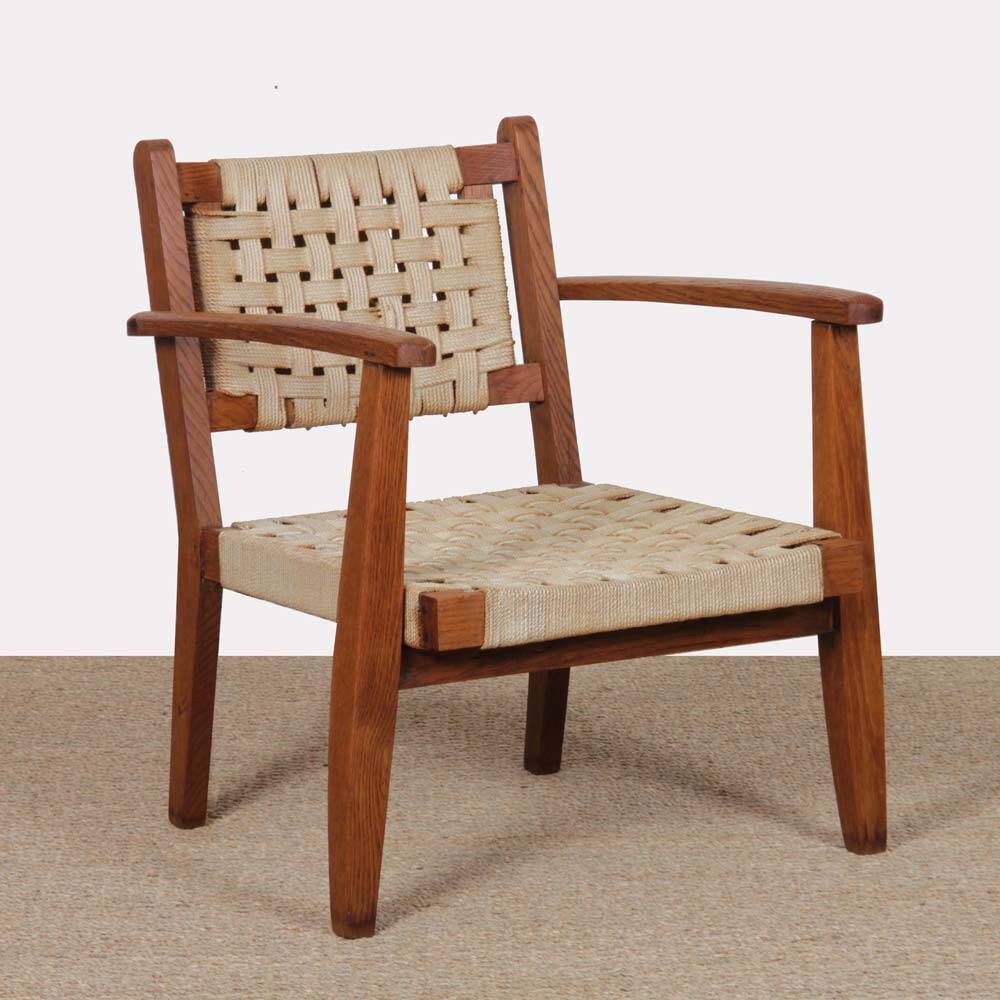 Armchair in solid oak and rope, 20th-century work.