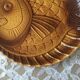 12 large fish plates in Sarreguemines slurry