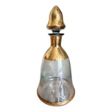 Glass and gilded bottle
