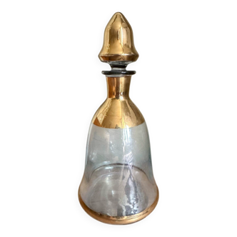 Glass and gilded bottle