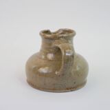 Flat jug in heavy beige stoneware