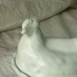 Candy hen on its porcelain nest