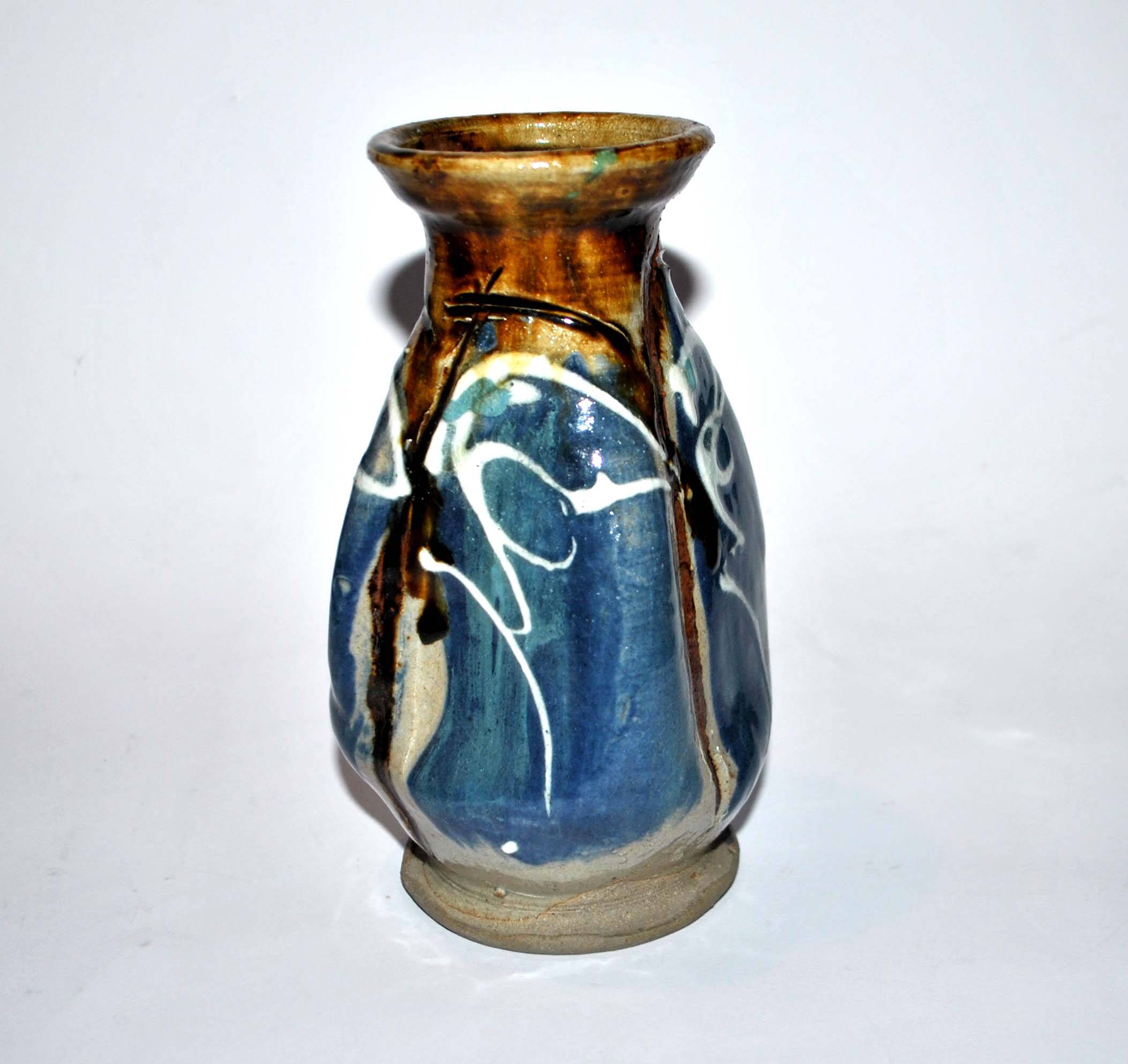 Old ceramic vase signed