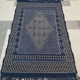 Hand-woven blue carpet in pure wool