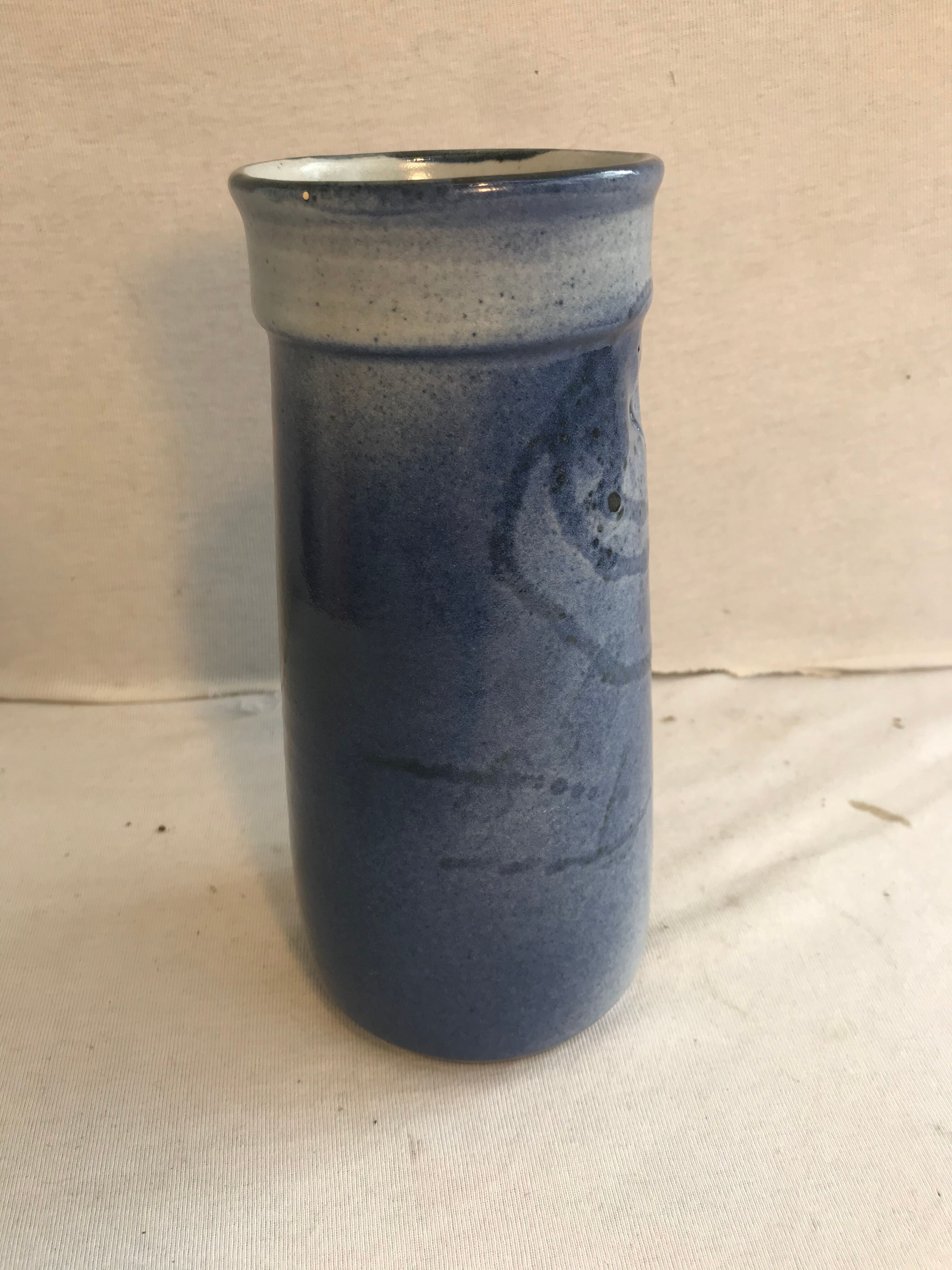 Old roll vase in blue sandstone