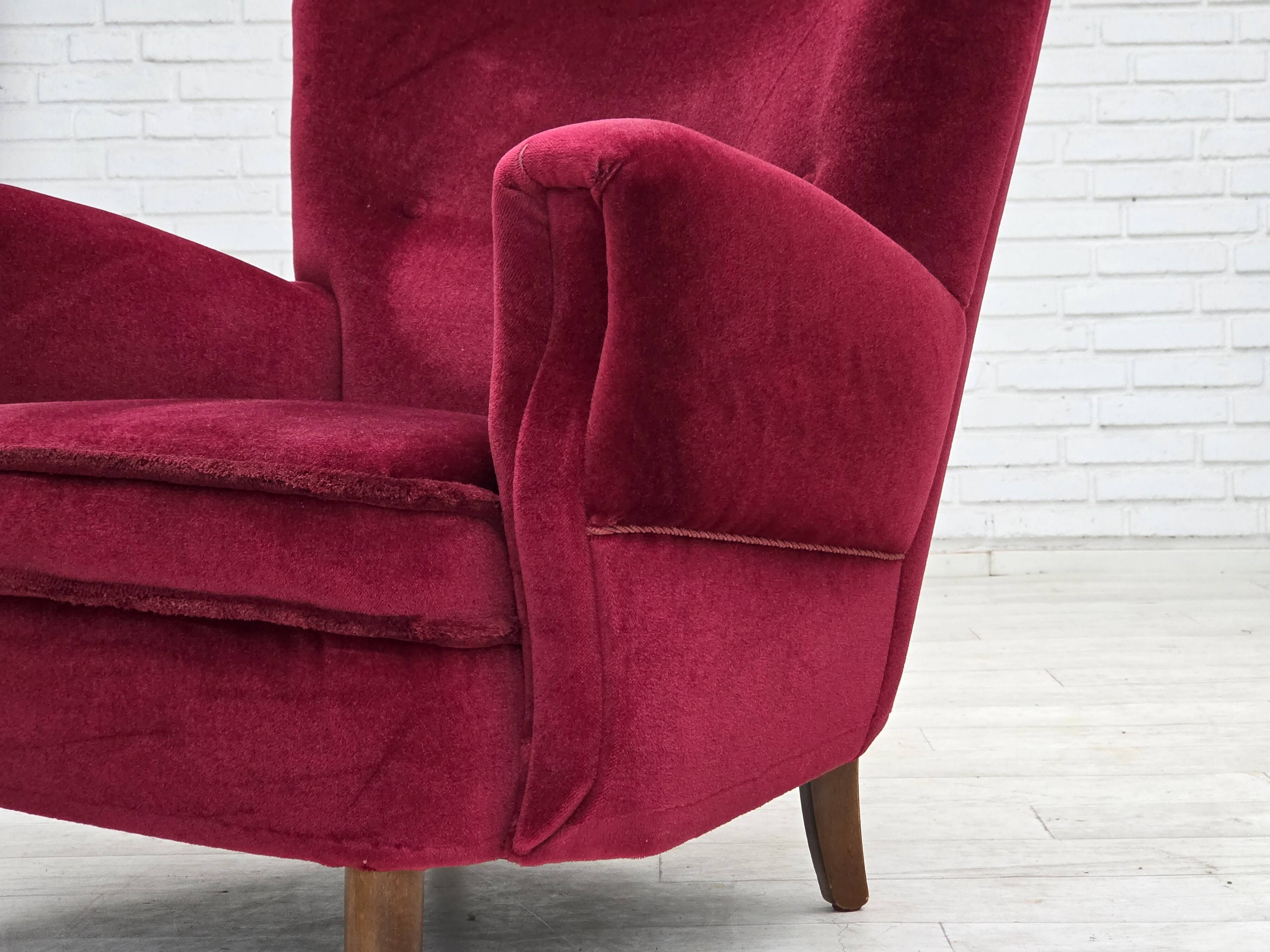 1960s, Danish armchair, cherry-red furniture velour, beech wood legs.
