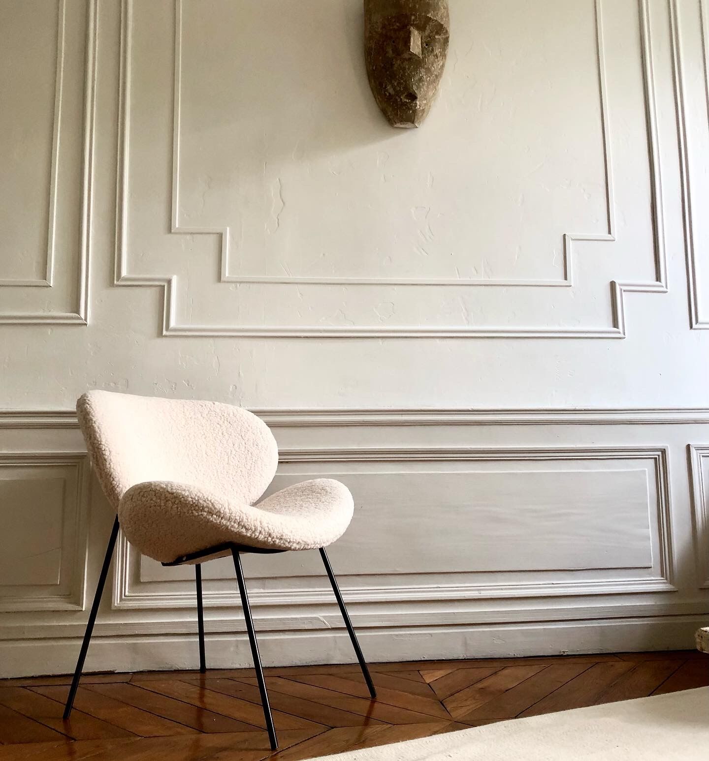 Contemporary design armchair in sheepskin