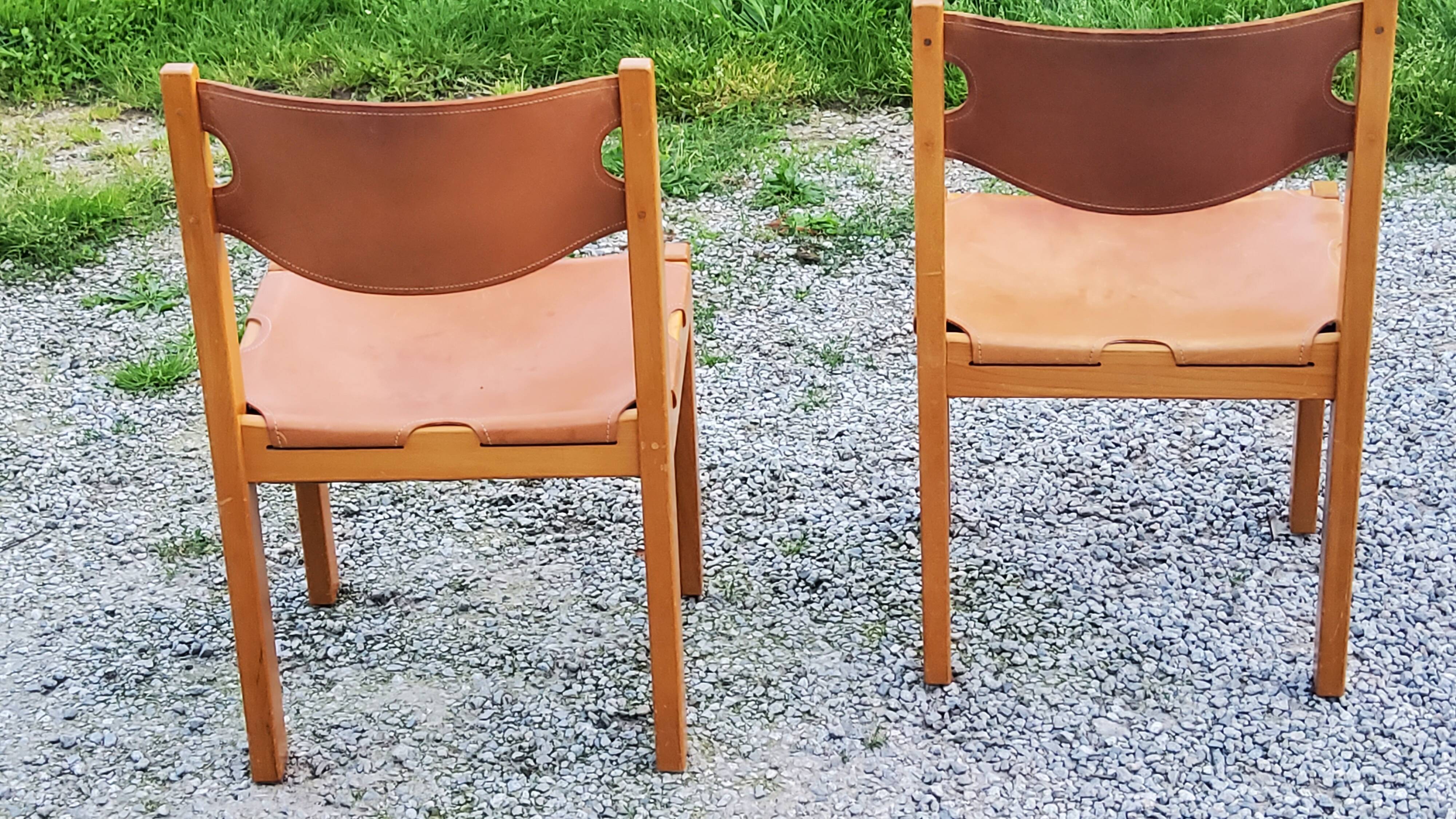 Pair of brutalist chairs in elm and stretched leather with saddle stitching Self publisher