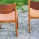 Pair of brutalist chairs in elm and stretched leather with saddle stitching Self publisher