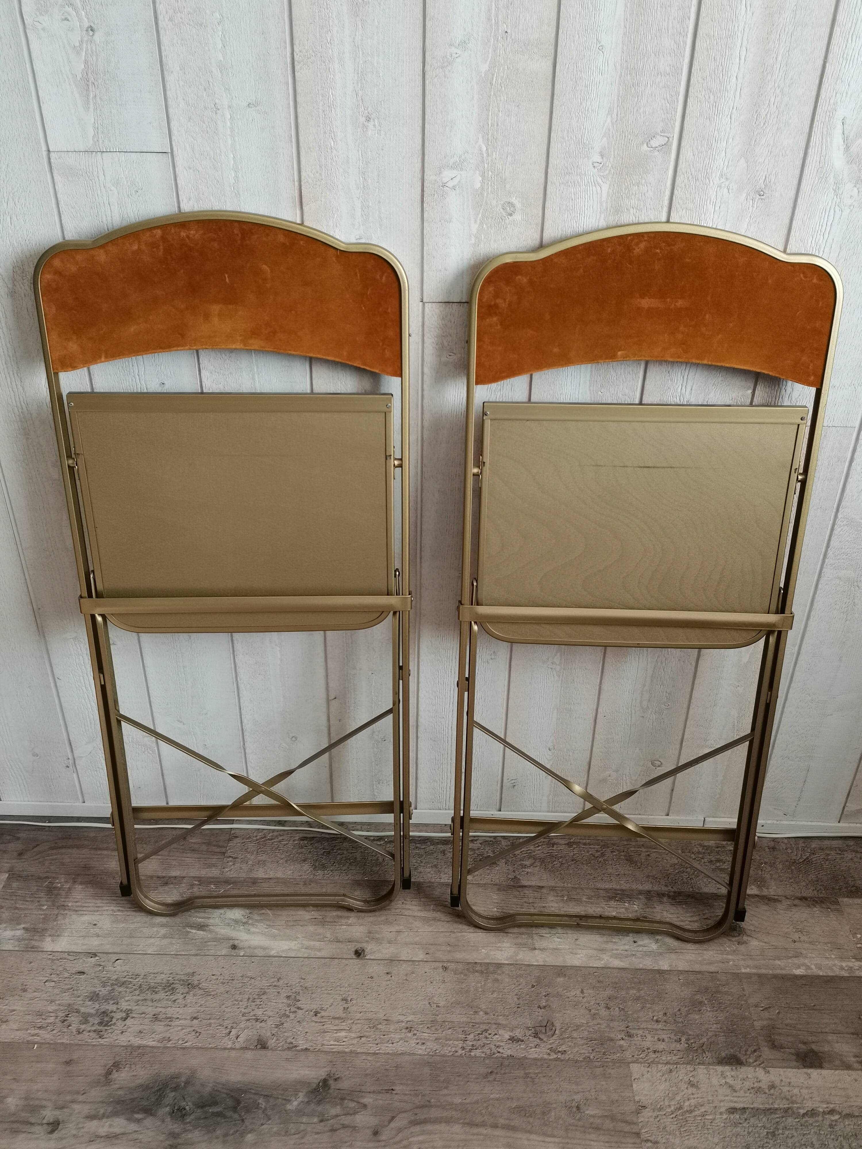 Two gold velvet chairs