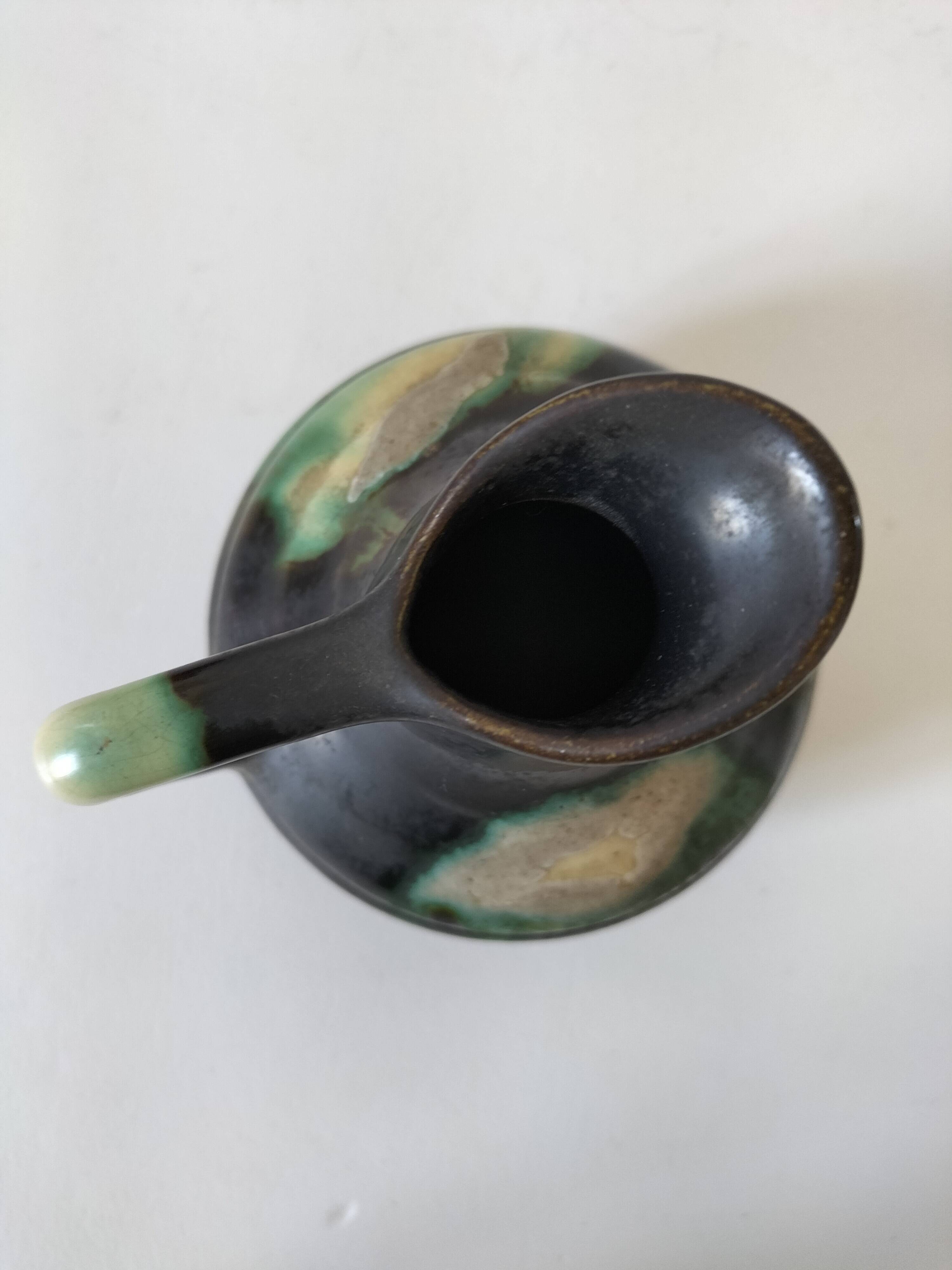 Ceramic pitcher Thulin Belgium flamed green black enamel