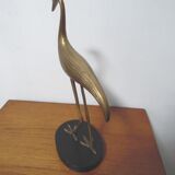 Brass heron standing