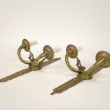Pair of two-armed Empire wall sconces in gilded bronze