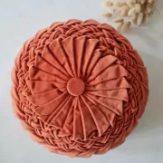 Pleated terracotta red velvet cushion