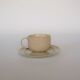 Coffee cup and vintage pyrity sandstone subcup