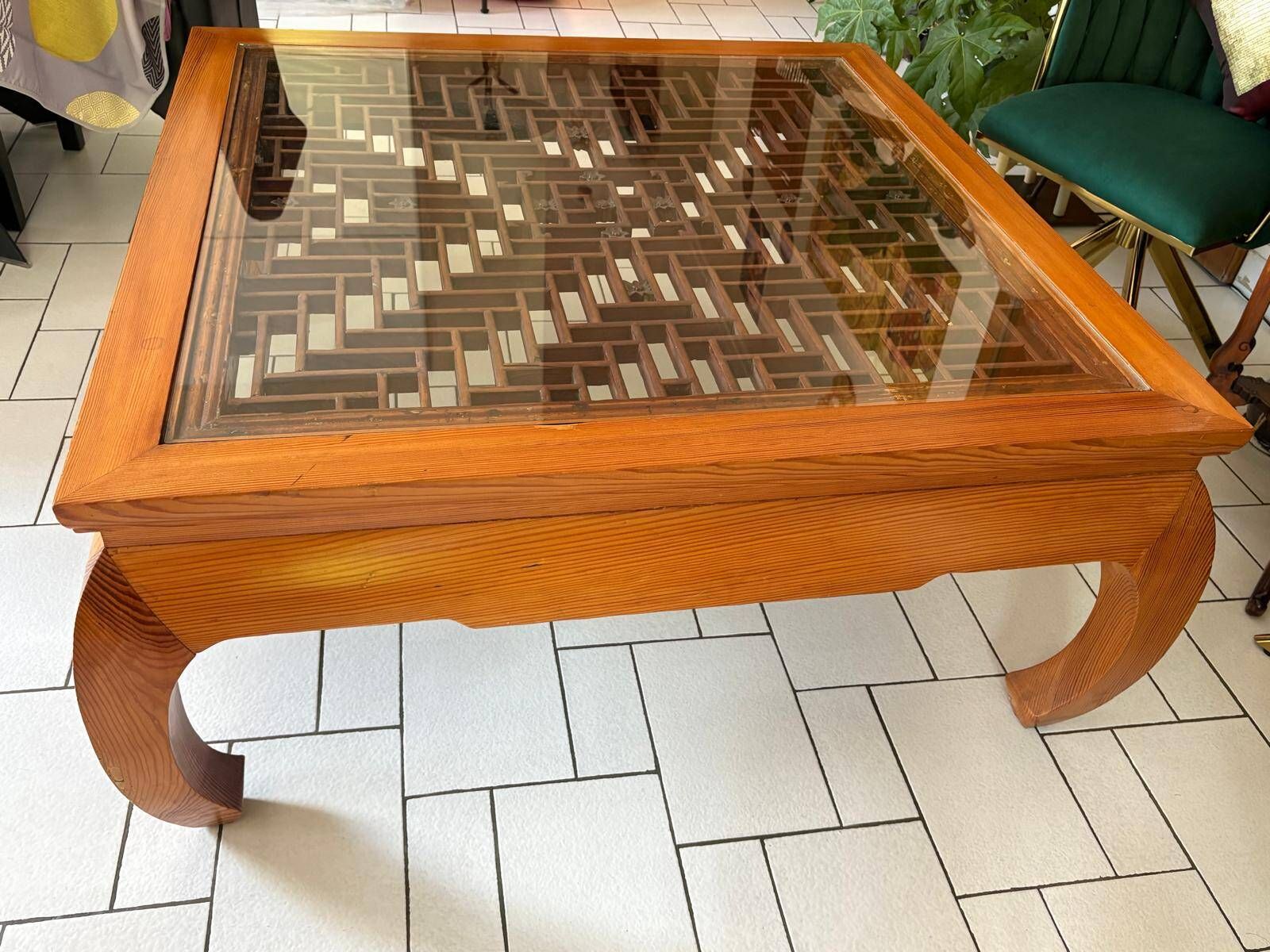 Large Chinese/Asian coffee table in wood – latticework decoration under varnish.