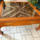 Large Chinese/Asian coffee table in wood – latticework decoration under varnish.