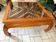 Large Chinese/Asian coffee table in wood – latticework decoration under varnish.