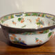 Shallow porcelain dish from Limoges Raynaud, bird decoration.