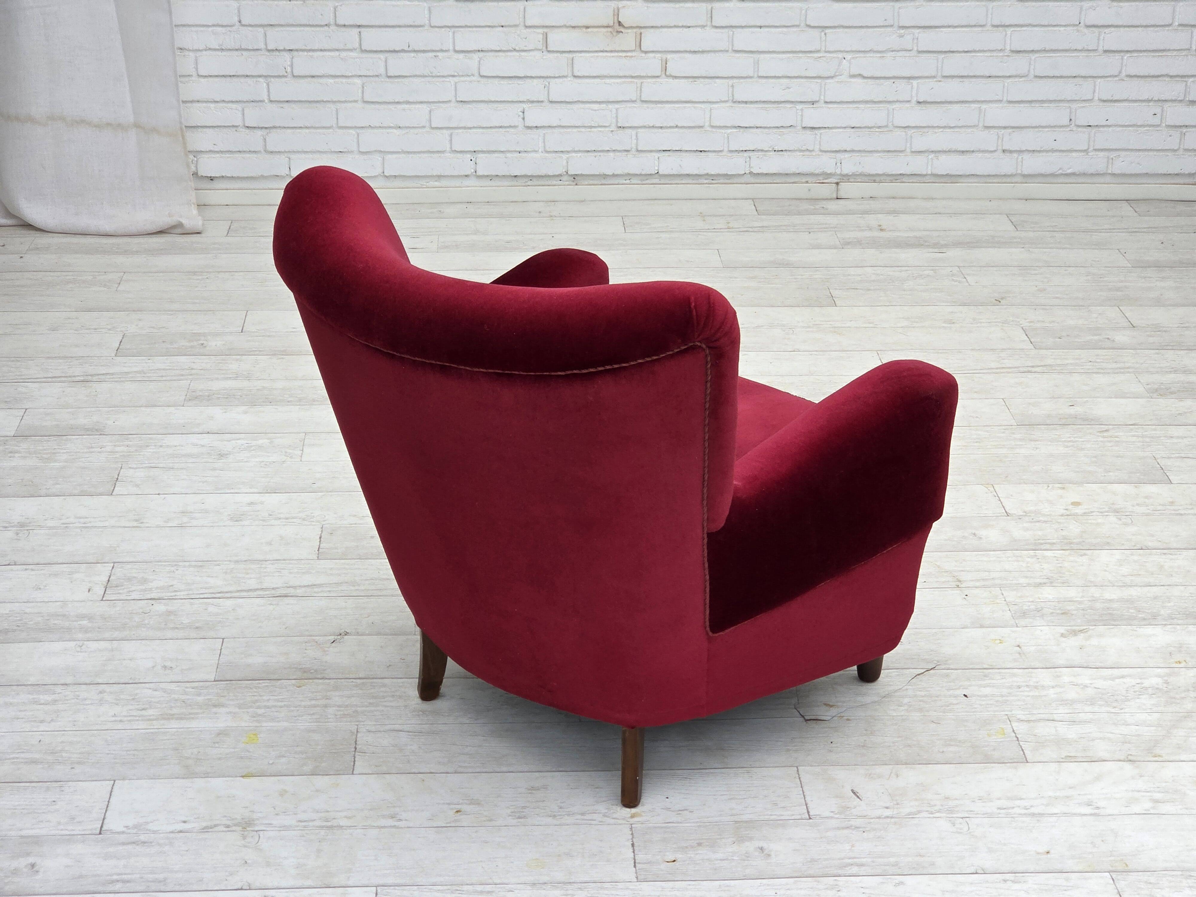 1960s, Danish armchair, cherry-red furniture velour, beech wood legs.