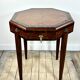Art Deco gueridon in walnut burl marquetry, 1930.