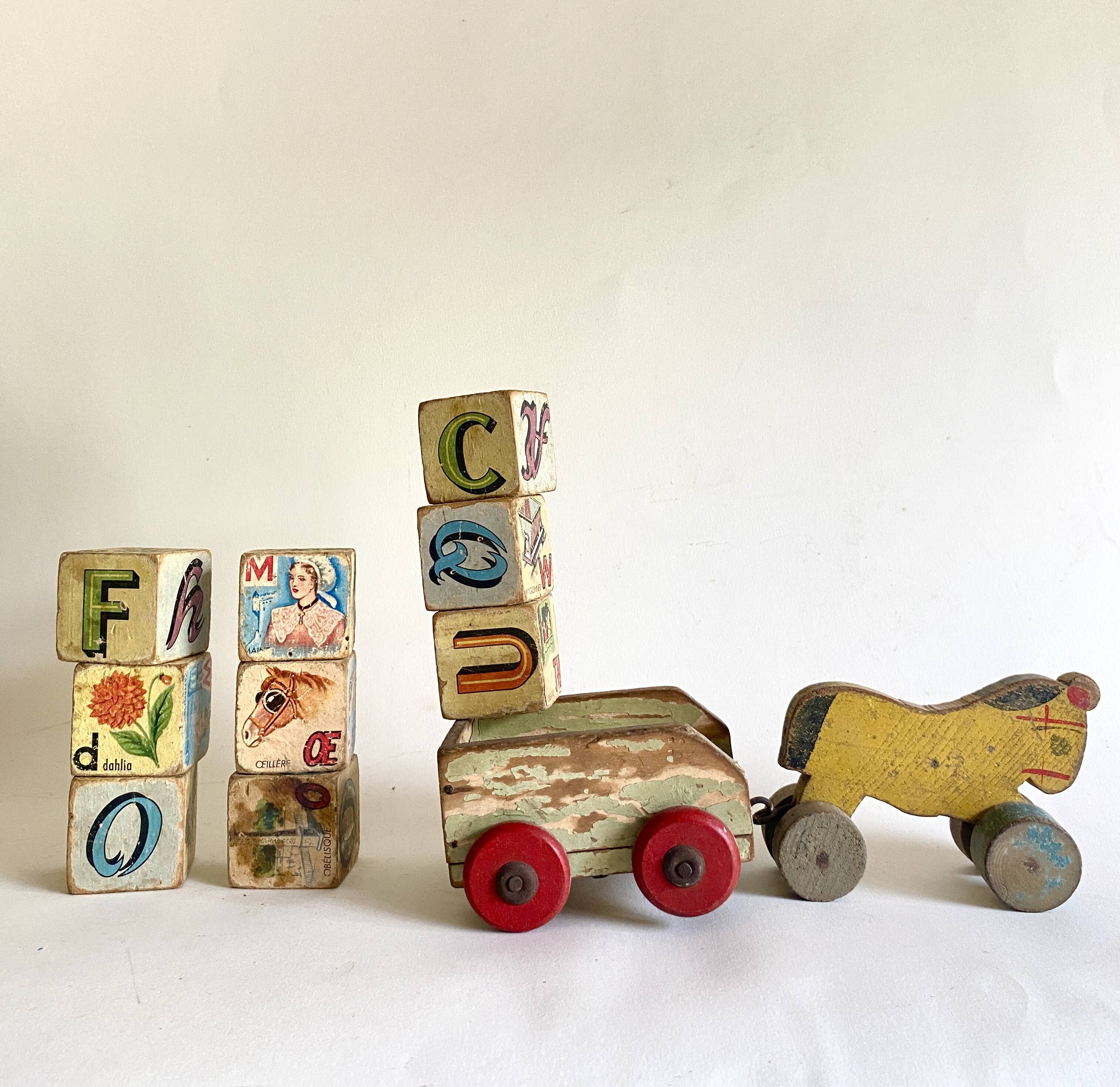 Wooden toy donkey and his cart