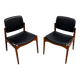Captain chair pair by Erik Buch