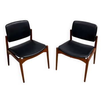 Captain chair pair by Erik Buch