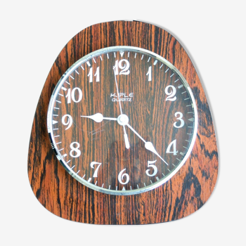Horloge Kiple en formica imitation bois années 70