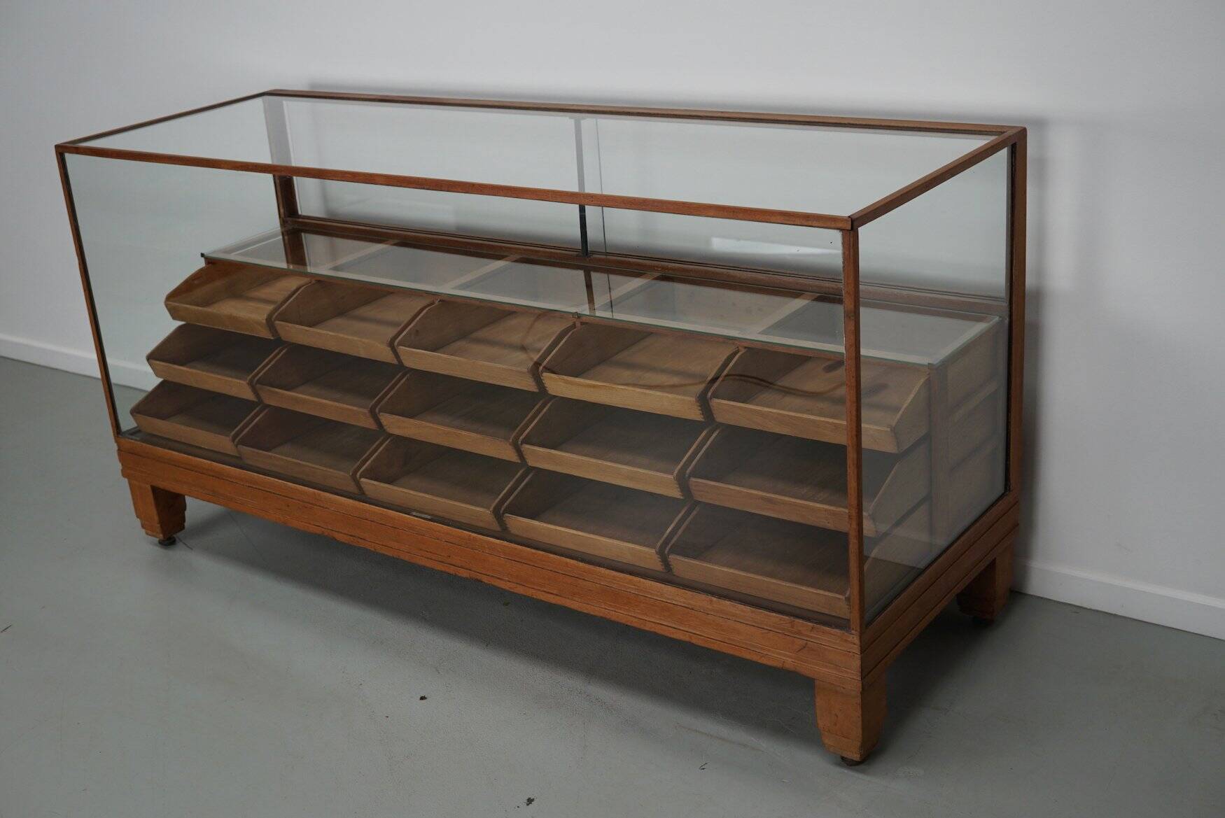 Antique British oak haberdashery cabinet, 1930s
