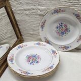 Set of 5 small flowered deep plates.