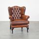Brown leather wingback Chesterfield armchair
