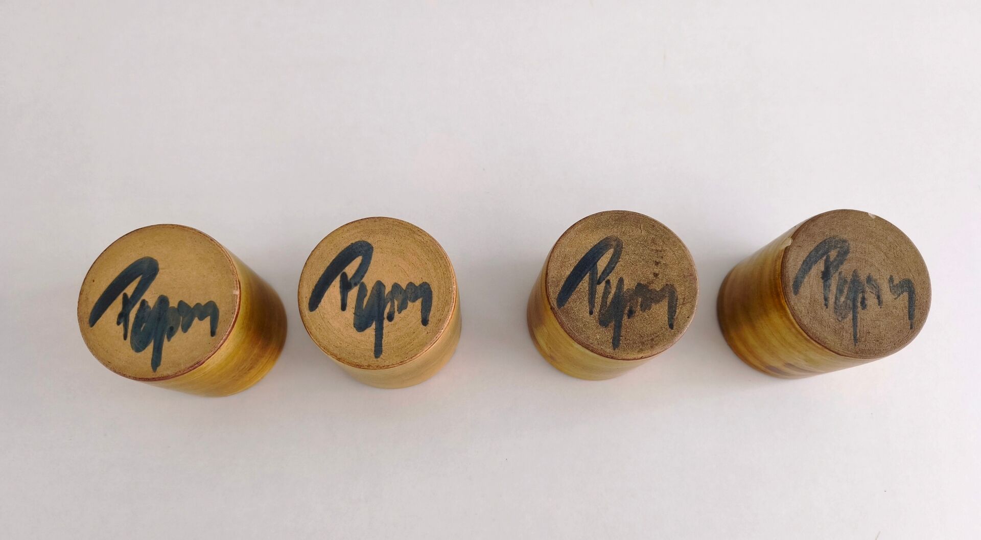 Set of 4 ceramic mugs signed Peyron