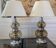 pair of smoked glass and chrome lamps