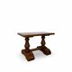 A small, rustic walnut wooden table, crafted from solid walnut wood, 1