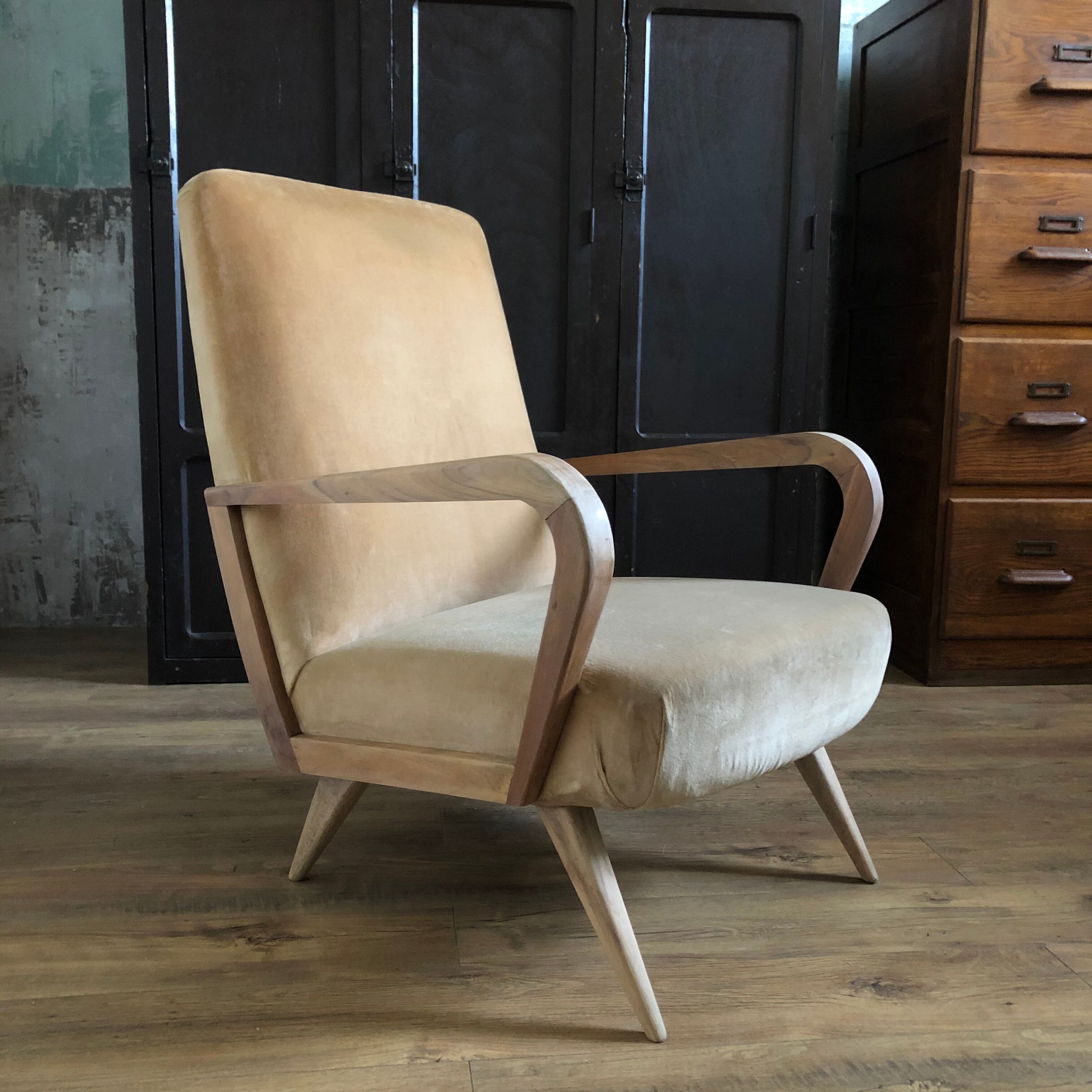 Velvet and wood armchair