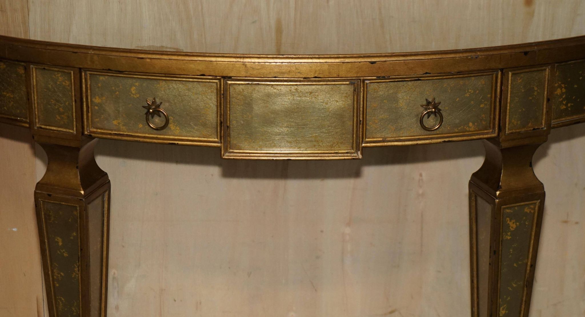 Half-moon console Eglomise Theodore Alexander with a gold finish.