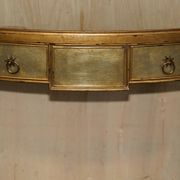 Half-moon console Eglomise Theodore Alexander with a gold finish.