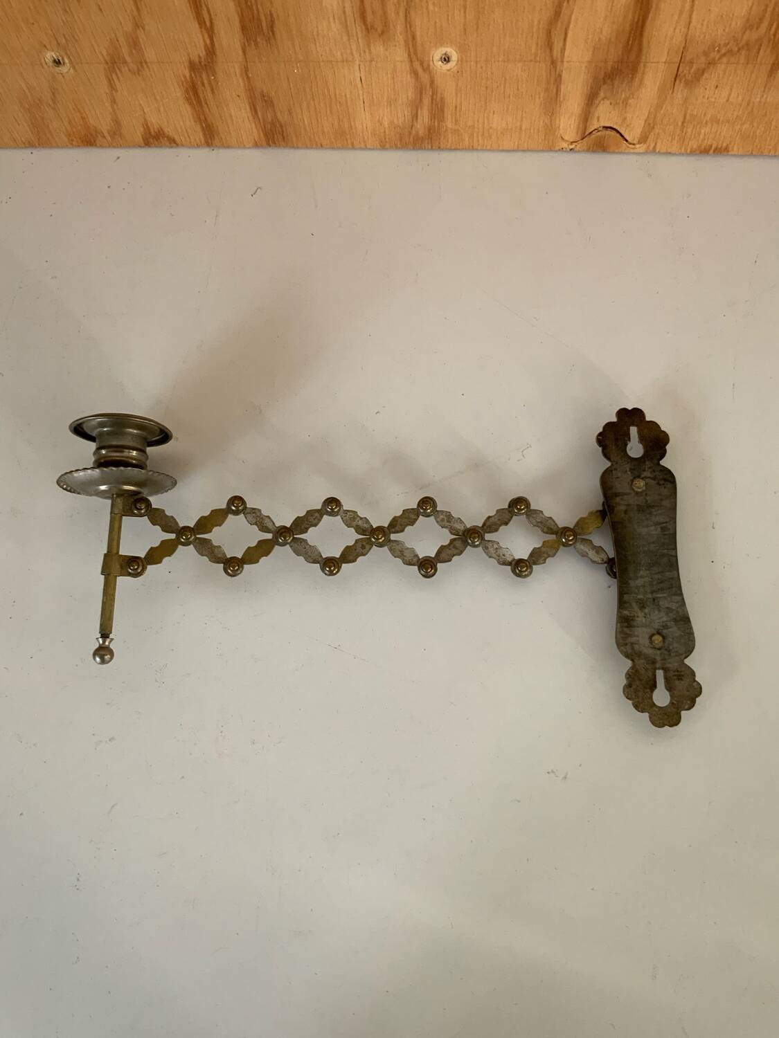 Old accordion candle holder