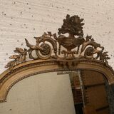 Louis XVI style mirror in wood and gilded stucco XIX century