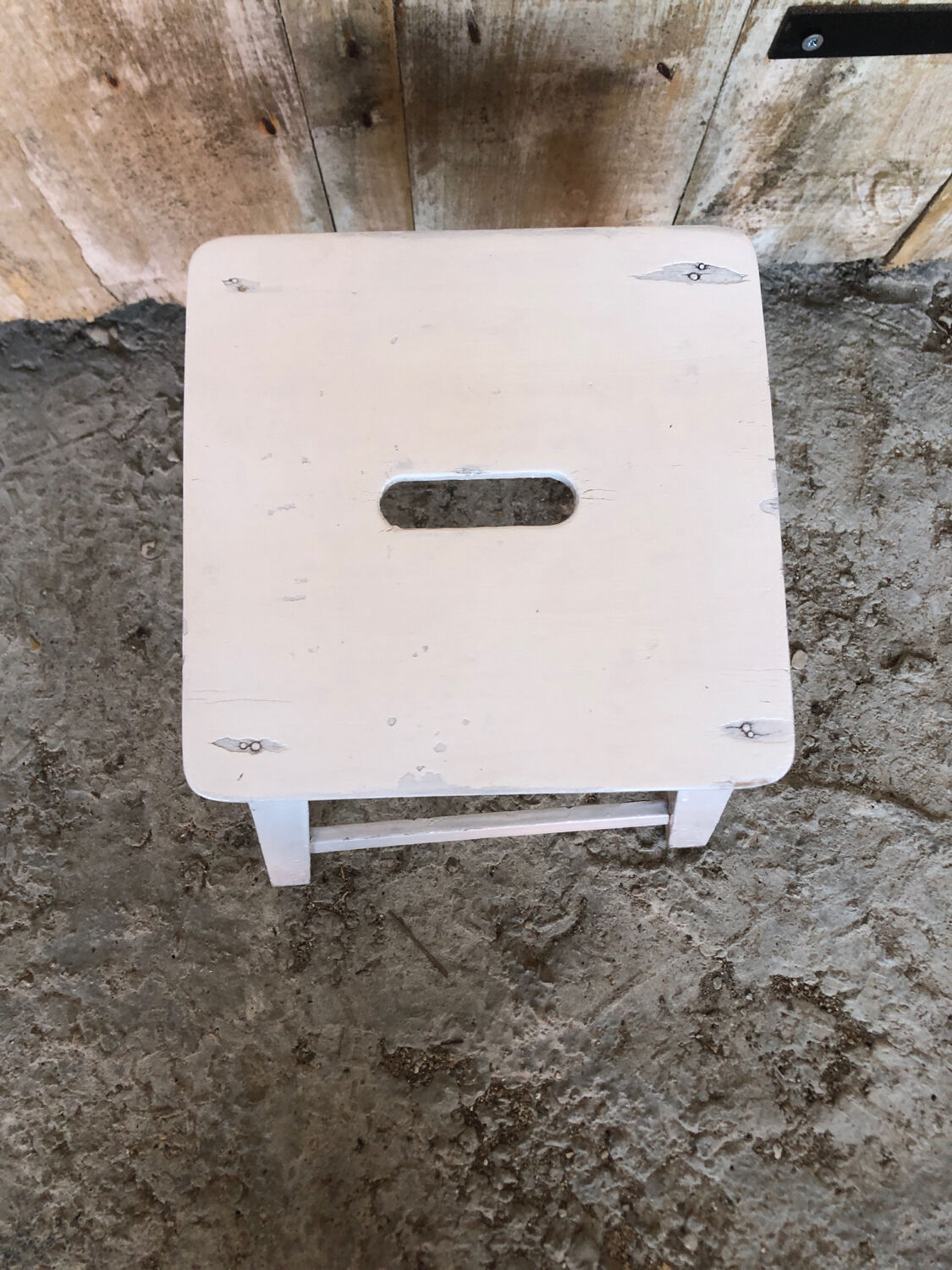 Vintage white wood milking stool