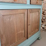 Buffet made of natural wood and bronze green.