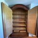 Glass-fronted lingerie wardrobe in solid wood
